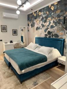 Postel nebo postele na pokoji v ubytování Sky Hotel Korce