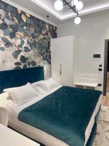Postel nebo postele na pokoji v ubytování Sky Hotel Korce