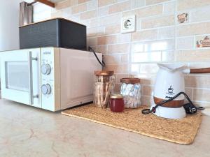 Kuchyň nebo kuchyňský kout v ubytování Guest House Alepou Leros