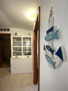Fotografie z fotogalerie ubytování Attico Amelia Soverato Con Terrazzo e Barbecue v destinaci Soverato Marina