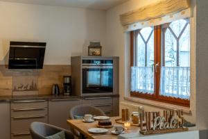 Kuchyňa alebo kuchynka v ubytovaní Chalet Zugspitzblick