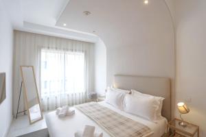 Postel nebo postele na pokoji v ubytování Résidence Eden - Maarif