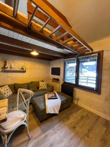 Μια τηλεόραση ή/και κέντρο ψυχαγωγίας στο Le Chalet du Petit Ours