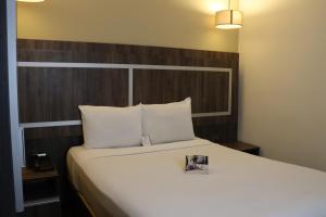 Postel nebo postele na pokoji v ubytování Rado Hotel - Santa María