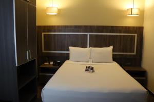 Postel nebo postele na pokoji v ubytování Rado Hotel - Santa María