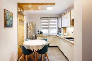 Kuchyň nebo kuchyňský kout v ubytování Bethlen Apartman