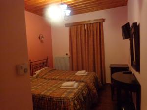Postel nebo postele na pokoji v ubytování Alonaki Guesthouse
