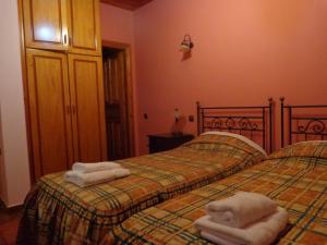 Postel nebo postele na pokoji v ubytování Alonaki Guesthouse