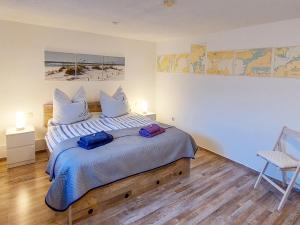 Voodi või voodid majutusasutuse Ferienwohnung Gänseblümchen toas