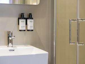 Koupelna v ubytování Lits de Lo - Boutique Rooms