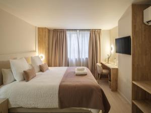 Postel nebo postele na pokoji v ubytování Lits de Lo - Boutique Rooms