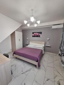 Postel nebo postele na pokoji v ubytování Casa Vacanze Belvedere