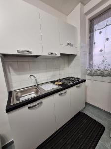 Kuchyň nebo kuchyňský kout v ubytování Casa Vacanze Belvedere + 37 fotografií