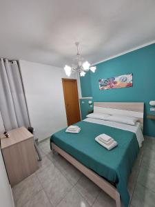 Postel nebo postele na pokoji v ubytování Casa Vacanze Belvedere