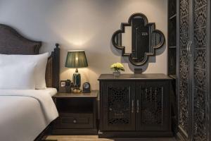 Кровать или кровати в номере Lalita Boutique Hotel & Spa Ninh Binh
