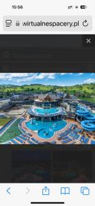 a screenshot of a video of a swimming pool at Ubytovanie Privat Antoni - apartmán v RD in Lazy pod Makytou