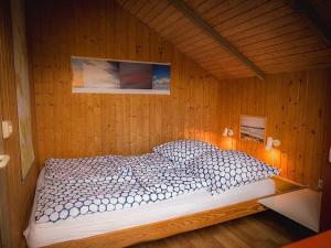 Ein Bett oder Betten in einem Zimmer der Unterkunft Ferienhaus "Sören"