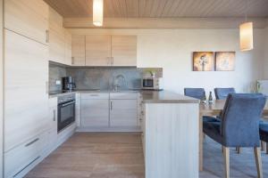 Η κουζίνα ή μικρή κουζίνα στο Ferienhaus Nordspitze