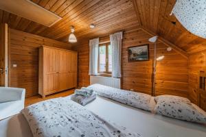 Letto o letti in una camera di Dachstein Chalet - Mountain view