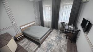 Postel nebo postele na pokoji v ubytování Viva Hotel