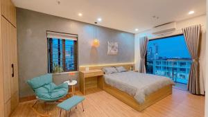 Ένα ή περισσότερα κρεβάτια σε δωμάτιο στο Reveur Apartment