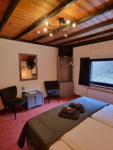 Postel nebo postele na pokoji v ubytování B&B Am Sahrbach