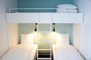 Postel nebo postele na pokoji v ubytování Motel X