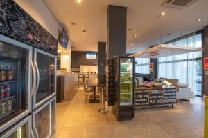 TV a/nebo společenská místnost v ubytování Hotel Nacional Inn Alagoinhas + 28 fotografií