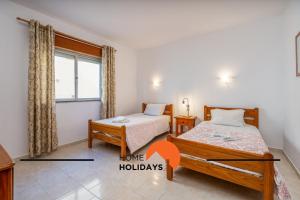 Gallery image of #263 Rosa Guest C House by Home Holidays in Caliços