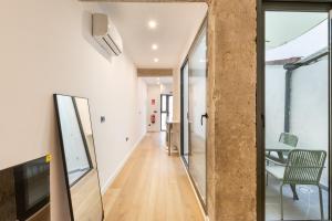 TV a/nebo společenská místnost v ubytování Turía Flats by Nomad Host