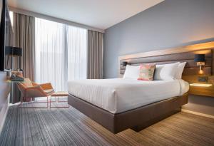 Voodi või voodid majutusasutuse Moxy Dublin City toas