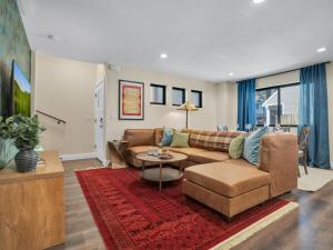 a living room with a couch and a table at 4BD Home - Games - Close to Downtown & Snowbowl in Flagstaff