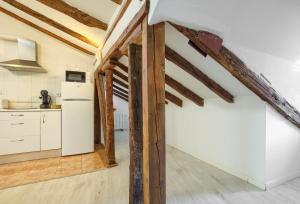 Η κουζίνα ή μικρή κουζίνα στο Apartamentos RyC +20 φωτογραφίες