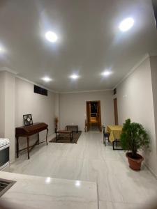 Posezení v ubytování Departamento Cómodos