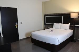 Postel nebo postele na pokoji v ubytování Rado Hotel - Santa María