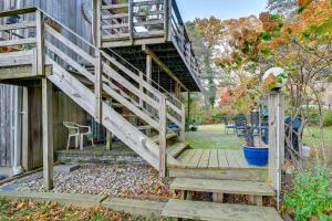 A garden outside Cozy Dix Hills Apt with Deck about 7 Mi to Beach!