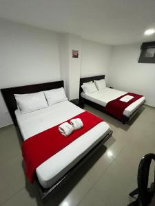 Postel nebo postele na pokoji v ubytování Hotel Castellon Plaza Pereira