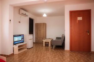 TV a/nebo společenská místnost v ubytování Hotel Blu Mare