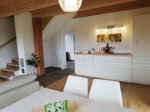 Kuchyň nebo kuchyňský kout v ubytování Golf Resort Klöch