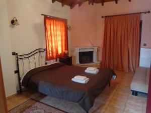 Postel nebo postele na pokoji v ubytování Alonaki Guesthouse