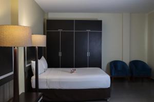 Postel nebo postele na pokoji v ubytování Rado Hotel - Santa María + 37 fotografií