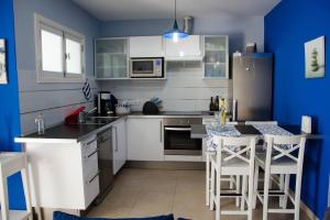 Η κουζίνα ή μικρή κουζίνα στο "Mi casita de la playa" +14 φωτογραφίες