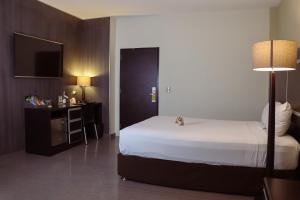 Postel nebo postele na pokoji v ubytování Rado Hotel - Santa María