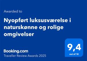 Certifikát, hodnocení, plakát nebo jiný dokument vystavený v ubytování Nyopført luksusværelse i naturskønne og rolige omgivelser