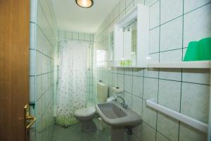 Koupelna v ubytování Apartments Renata