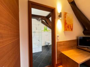 TV a/nebo společenská místnost v ubytování Hotel Haimerlhof + 22 fotografií