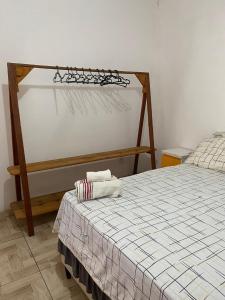 Letto o letti in una camera di Casa da Cris em Praia do Grauçá com Wi-Fi, ar condicionado e garagem