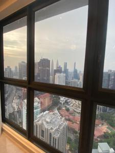 Nespecifikovaný výhled na destinaci Kuala Lumpur nebo výhled na město při pohledu z apartmánu