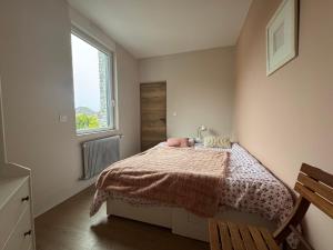 Postel nebo postele na pokoji v ubytování Maison La Lensoise - 4 chambres - Stade Bollaert + 16 fotografií