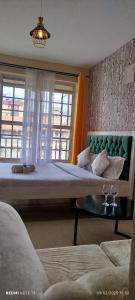 Ένα ή περισσότερα κρεβάτια σε δωμάτιο στο Sunny studio chic comfort near UN